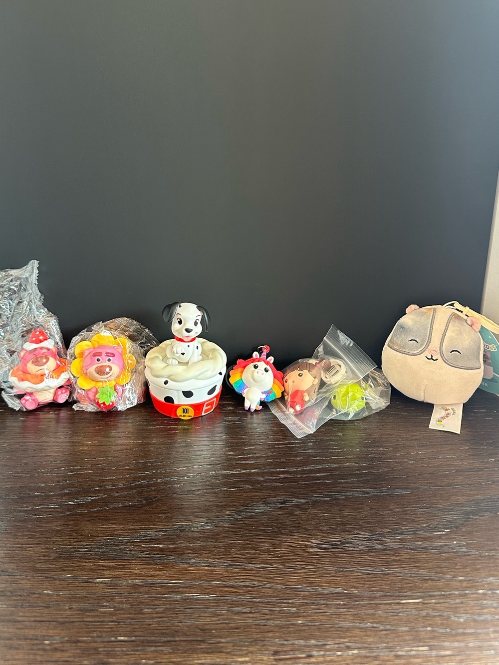Lot of Disney / Pixar characters, and Squishmallow 🖤🤍♥️🌈🩷